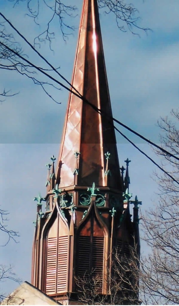 Copper church steeple with green patina accents