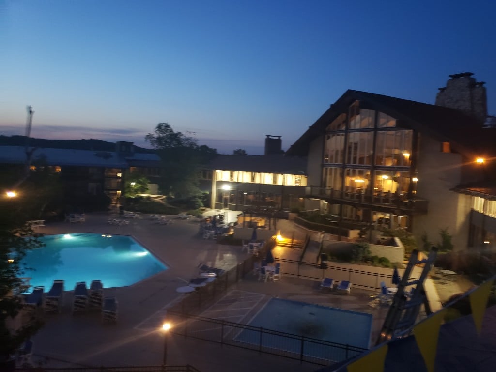 Resort lodge roofing project at twilight